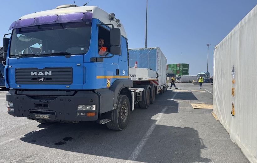 Truck with a container at a port ready for a cross border run